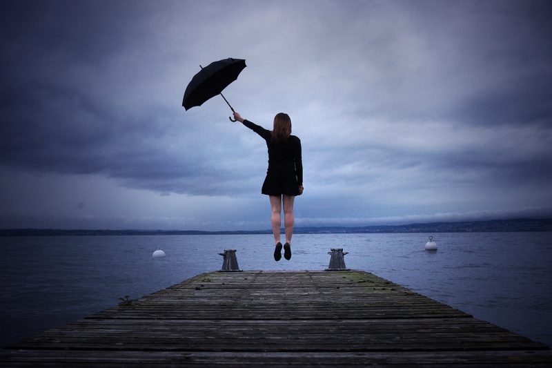 Delphine Millet Envol - Staged photography delicate sensitive surrealist lake mary poppins umbrella flying dream believe - Art conceptual photographer in Berlin