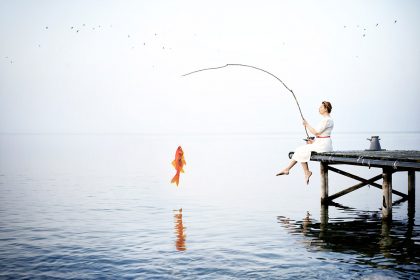 Delphine Millet Fish in the sea - Staged photography delicate sensitive surrealist minimalist lake goldfish humor funny - Art conceptual photographer in Berlin