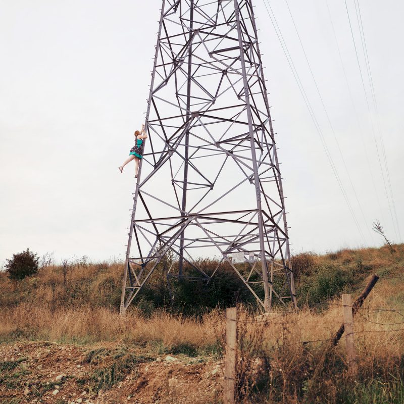 Delphine Millet Never too high - Staged photography delicate sensitive climb electric tower danger magic surrealist - Art conceptual photographer in Berlin